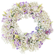This image shows a meticulously crafted circular funeral wreath displayed against a pristine white background, allowing every floral detail to stand out clearly. The entire ring is densely clad in Baby's Breath, the countless tiny blooms forming a soft, cloud-like halo that gives the wreath a weightless, airy character. Their pure white colour creates a sense of innocence and peace, while the fine branching stems add an intricate, lace-like texture. Scattered harmoniously throughout this misty base are larger Lisianthus flowers, opening in delicate layers of white with petal edges gently brushed in shades of violet, lavender, and soft mauve. Some blossoms are fully open, revealing darker, more shadowed centers, while others are partially closed buds, tinged with pale green and a hint of creamy yellow, suggesting new life within the circle of remembrance. The tone is serene and reflective, as if prepared for a quiet service at a chapel near Queensbury or laid by hand at a graveside ceremony. The open center of the wreath forms a precise, unbroken ring that symbolises eternity and unending love, while the smooth white backdrop removes any distractions, focusing attention solely on the flowers. Soft, even lighting bathes the arrangement, enhancing the velvety texture of the Lisianthus and the feathery clusters of Gypsophila. The overall impression is one of understated elegance and gentle comfort, a fitting floral tribute for funerals, memorial services, or private moments of remembrance within the Queensbury community.
