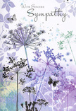 This sympathy card is like a gentle visual sigh, a calm scene that could easily echo the peaceful corners of Queensbury's residential streets at twilight. A collection of airy wildflowers rises from the lower edge, their stems long and fine, carrying delicate, umbrella-shaped blooms that appear almost weightless. The colour palette rests in cool, comforting tones - layers of lavender, indigo-touched blue, and silvery sage - washed softly across the background so that no single shade dominates. Each bloom is drawn with carefully spaced lines, leaving pockets of white that allow the design to breathe, as if the flowers were bathed in soft, diffused light after a gentle rain. Scattered among the stems, a few butterflies drift with barely-there outlines, their wings tinted in the same muted hues, suggesting transformation, remembrance, and the quiet presence of those we've lost. The negative space around the illustration feels intentional, offering room for emotion and reflection rather than overwhelming the senses. This is the same thoughtful restraint we bring to funeral tributes arranged for families across Queensbury, where subtle colour and line carry deep meaning. The card's overall mood is tender and contemplative - an invitation to pause, to think of shared moments, and to send love without needing many words. Paired with a simple condolence bouquet, it becomes a gentle way to express sympathy, suitable for local deliveries to homes, chapels, or memorial services and crafted with the same care as a florist's hand-tied tribute.